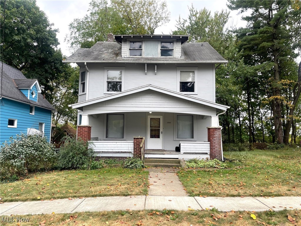 This two-story home has 1,668 sf of living space and three bedrooms on the second floor. The oak kitchen cabinetry has recently been updated. There is a formal dining room and the living room has a faux fireplace with a mantel and built in shelving. There is also a first floor study or office with the original pocket door. The home has lovely original trim throughout. There is an attic for additional storage and the basement has glass block windows. The exterior was recently painted. Relax and unwind on your covered front porch.