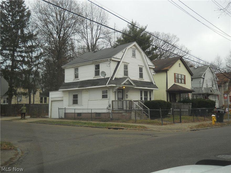 Welcome to this cozy 3 bedroom colonial 3 blocks south of the heart of the Highland Square community in Akron.  Updated throughout, this home features a new kitchen top to bottom.  The first floor also features a spacious dining room and a living room with a decorative fireplace and plenty of storage.  Upstairs you'll find 3 carpeted bedrooms, each with its own ceiling fan, and an updated full bath.  Additionally, this home has a tidy, full basement with laundry hookups, a fully fenced in rear with plenty of parking, and a one-car garage with extra tall ceilings, and an overhead door with a remote opener.  Garage roof is 5 years young, furnace and hot water tank are both newer as well.  Schedule your appointment today to see this move-in ready space.