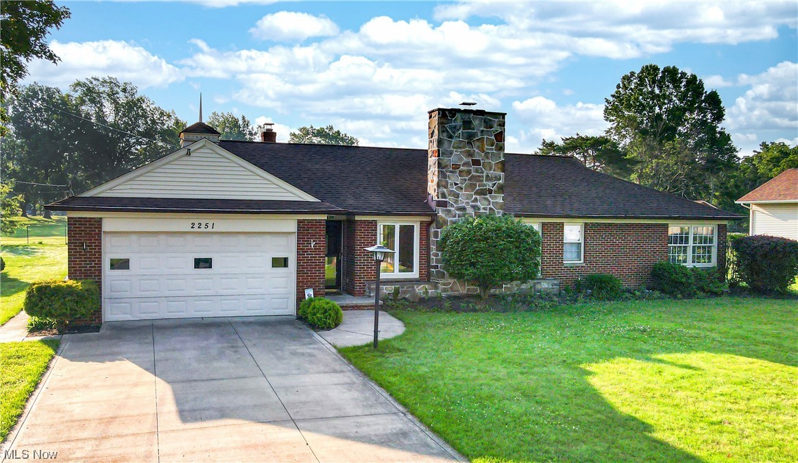 This home is a golfers dream! Welcome to 2251 Pine Ridge Dr! This beautiful ranch home is located on the 5th hole of Pine Ridge Country Club. This home has an open and easy layout for all of your needs! The large living room features a beautiful fireplace and is overlooked by the dining room. The back of the house has an additional living space with an ample amount of room and windows to enjoy the natural light! All three of the bedrooms are a very comfortable size with a good amount of closet space. The backyard has a beautiful deck is perfect for entertaining. This home has so much to offer and it won't last long! Call your agent and check it out TODAY!