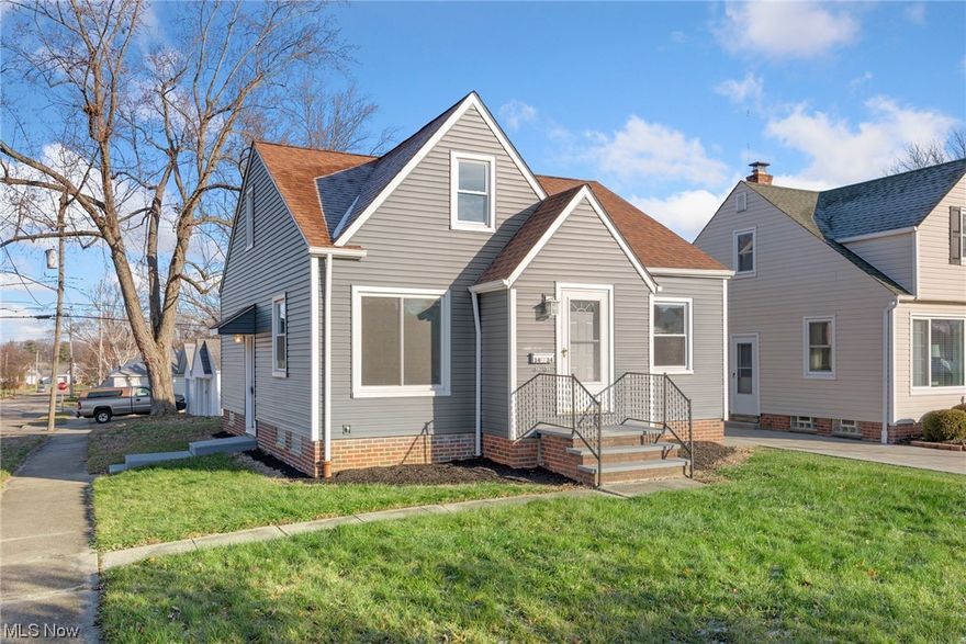 Welcome to this move-in ready home that has undergone renovations in 2023 that are sure to stay in style for years to come. Enter through the front door into a vestibule with a spacious closet for outerwear storage. The main living space is filled with natural light and features new laminate floors. The house has been painted a neutral color to fit any decor style. The eat-in kitchen features white cabinetry, a section of butcher block counters, stainless steel appliances, and direct access to the back deck through French doors. The full bathroom is modern with a white vanity & shower/tub combo. The upper level is an open space with vaulted ceilings and hardwood floors. This space is perfect to serve as a playroom, office, gym, or additional bedroom. The sprawling renovated basement extends the footprint of this home with plush carpet, grey walls, and 1/2 bath. Basement laundry machines included. A detached two car garage sits at the rear of this corner lot with access on Lyle Ave.