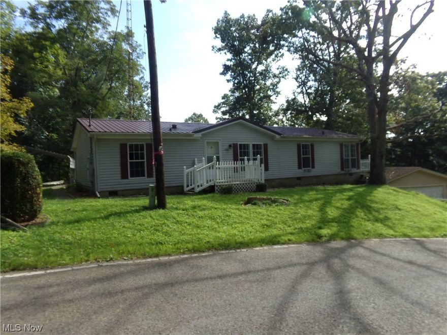 ENJOY YOUR VIEW FROM THIS 3 BEDROOM HOME WITH 2 BATHS.
WALK AROUND DECK TO SIT AND RELAX WITH THE VEIW OF WATER WHEN THE LEAVES FALL.
HAS ALL APPLIANCES TO STAY RANGE, REFRIGERATOR, DISHWASHER, MICROWAVE, AND WASHER AND DRYER.
HAS A BEAUTIFUL VIEW OUT THE BIG WINDOWS IN THE LIVINROOM.
HOME HAS A GENERAC, CARPORT, AND SHED.