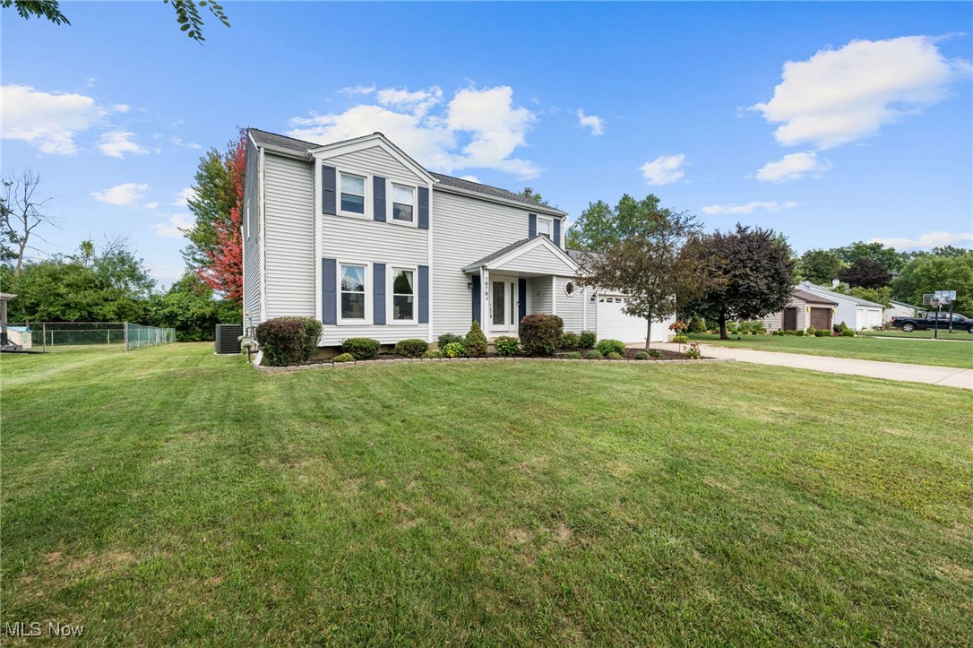 Nicely kept and spacious. This home has 3 generous sized bedrooms, 2.5 baths which have all been remodeled! Master bath has a tile shower and the ever-popular barn door! Engineered wood flooring covers the first floor of the home and there is no shortage of natural lighting! The Family room boasts a gas fireplace and sliding glass door that opens to an oversized and down to a paver patio with firepit! If you like to entertain, especially outside, this is the perfect home for it! To make it easier and to put your mind at easy, most appliances are included as well as a 1 year home warranty! The Community pool, playground, pavilion and basketball court are an added attraction! Come take a peak, you will love it here!