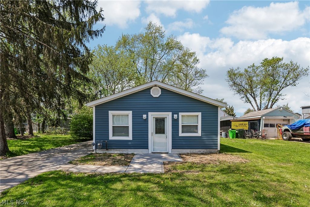 Photo of 1424 5th Street, Lakemore, OH 44250 (MLS # 5203200)