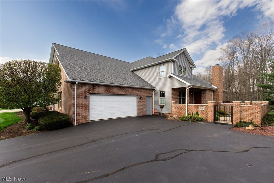 Dreams really do come true! Welcome to this elegant courtyard home at The Legends in Howland, offering the peaceful, private, and carefree lifestyle you’ve been dreaming of. Perfectly positioned with serene views of the lake’s fountain and the golf course, this original-owner home is available for the first time. Inside, neutral décor and tasteful custom window treatments create a warm, timeless feel throughout. The stunning great room is highlighted by soaring windows and a cozy gas log fireplace, while the open design flows effortlessly into a beautifully appointed kitchen featuring rich cherry wood cabinetry, Corian countertops, abundant storage, and an impressive wall of windows. Designed with comfort and privacy in mind, this home offers two spacious bedroom suites—one on each level—both complete with custom walk-in wardrobes.  A versatile loft overlooks the great room below, adding to the home’s open, airy appeal. Enjoy low-maintenance living with community amenities that include a great place to walk, a clubhouse, and a swimming pool. Thoughtfully designed and meticulously cared for, this is a rare opportunity to own a truly special home in The Legends.