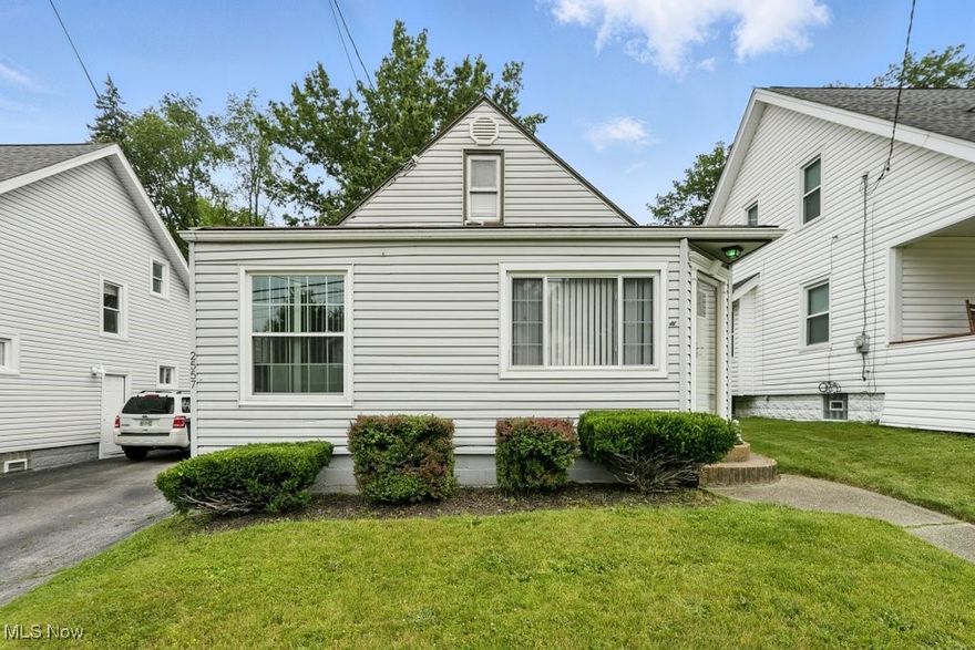 Great find in Ellet! 3BR Cape Cod with possible 4th in the finished basement space. Beautiful hardwood floors throughout most of the above ground living space giving it the charm and character that make it feel like a comfy place to call home! Enter through the front door and find a large living room with 3 windows AND a big picture window letting in loads of natural light! The kitchen features ceramic tile flooring, comes equipped with a fridge and gas range, a nice dining area with table and bench that stays, and a side entrance with a beatiful porch that has storage underneath. There is room to add a dishwasher beside the sink as well! Down the hallway is the full bathroom and 2 bedrooms. The main bedroom has a newer sliding door to the back deck and fully fenced backyard. Head up the stairs and you will find the 3rd bedroom and storage areas. The basement has been partially finished boasting a nice sized rec room or family room and a 4th bedroom. This home has a lot of space inside and out including a 1 car garage and fully fenced backyard to enjoy on these great summer days coming our way. Many updates over the years including windows, exterior doors (this year), side porch, rear deck, french drains, and more. Convenient location close to schools, shopping, and dining. Owner is selling AS-IS and will not be doing any repairs.