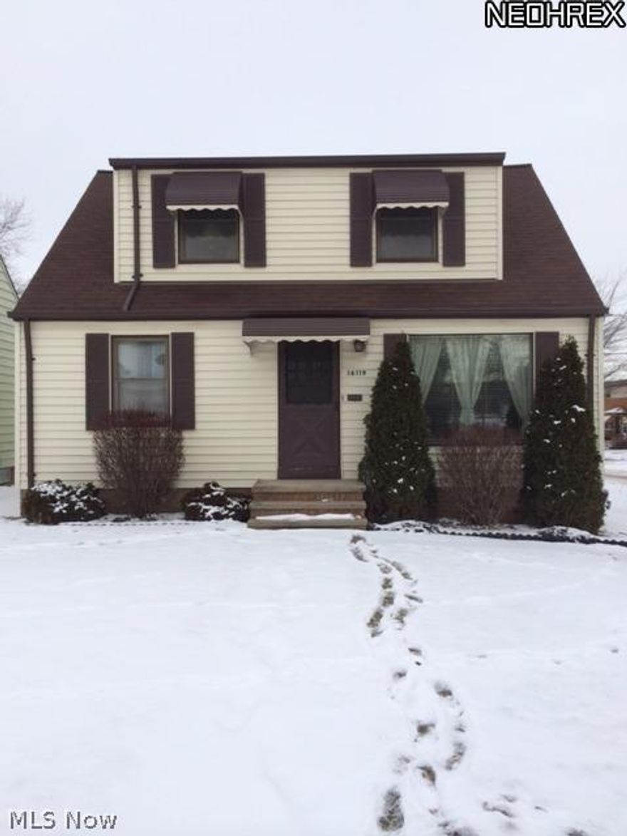 Great buy in Maple Heights!  This stunning three bedroom bungalow has everything the first time home buyer needs!  Enjoy the recently remodeled kitchen. The living room boasts hardwood floors underneath the carpet.  The upstairs has an additional bedroom plus a bonus room which can double as a office or lounging area.  The basement is finished with a kitchen, shower and half bath.  The house is great for entertaining.  Enjoy the carport which is used as a patio. This is an estate so they are willing to entertain any and all offers.  Do not wait this will not last long!