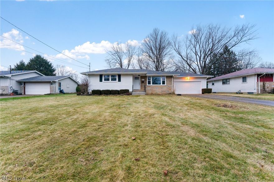 Remarkable ranch with all the necessary updates DONE! Large living room with hardwood floors, completely updated eat in kitchen with all appliances, 3 nicely sized bedrooms all with refinished original hardwood flooring, updated full bath and direct access to rear patio. Lower level plays host to rec room, full bath, laundry and plenty of room for storage. Call Today!!!