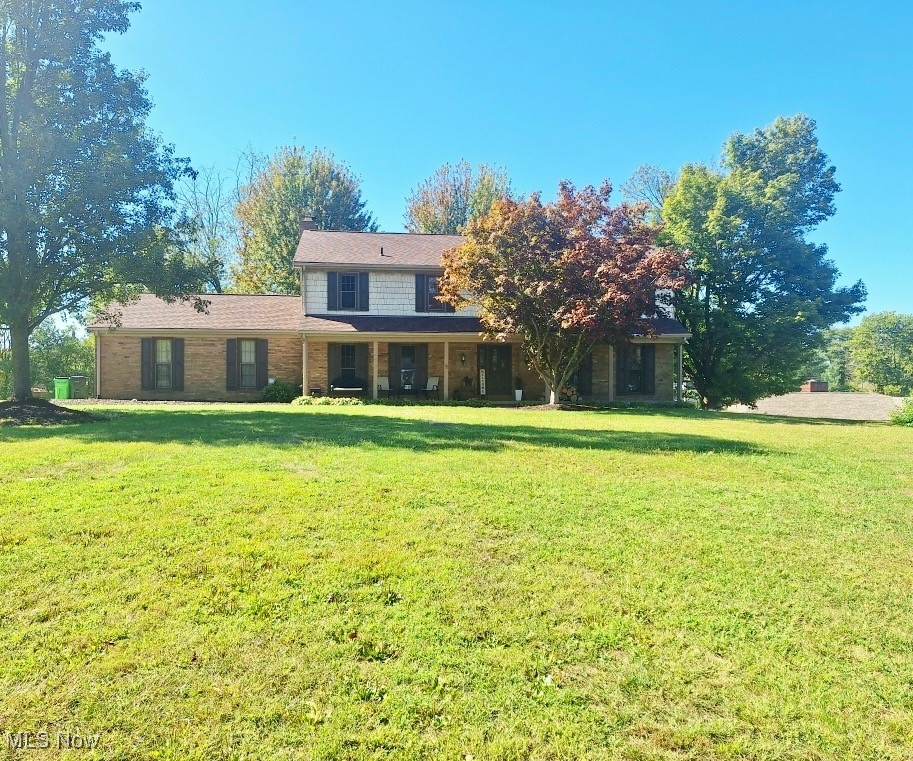 Welcome to 1141 Las Olas Blvd NW, where timeless charm meets modern comfort. Set on just over an acre in one of North Canton’s most established neighborhoods, this spacious colonial offers over 3,800 square feet of well-designed living space—perfect for relaxing, hosting, and everything in between. Step into the welcoming foyer and discover rich hardwood floors and expansive formal living and dining rooms filled with natural light. At the heart of the living space is the kind of fireplace that just pulls you in—cozy, charming, and full of character. It’s the perfect spot to curl up on the couch with a good book, unwind after a long day, or hang stockings during the holidays. With its classic mantle and warm glow, this fireplace gives the whole room that “this is home” feeling
The updated eat-in kitchen features vaulted ceilings, light maple cabinetry, a stylish tile backsplash, and under-cabinet lighting—offering both function and a warm, welcoming feel. From everyday breakfasts to weekend baking sessions, this kitchen delivers.
Just off the kitchen, the sun-drenched three-season room adds an extra layer of comfort. With panoramic views of the backyard and tons of natural light, it’s the perfect space to sip, sit, or unwind. Upstairs, you’ll find four spacious bedrooms with generous closets and tons of flexibility. Downstairs, the finished lower level provides room for a home office, workout zone, playroom, or media lounge—whatever fits your lifestyle. Additional highlights include a large mudroom, attached 2-car garage, full basement, and a private backyard with space to roam or garden. Tucked in a peaceful yet convenient location close to schools, parks, shopping, and major highways, this home truly checks all the boxes. If you’re looking for warmth, space, and character—especially that one-of-a-kind fireplace moment—this home is ready to welcome you.