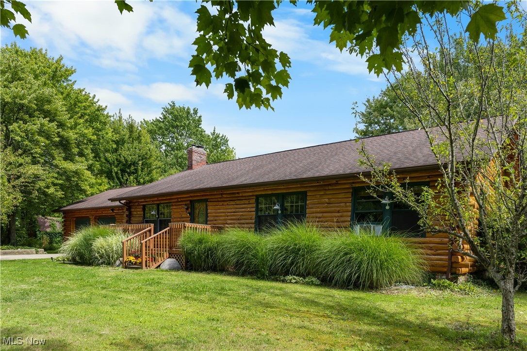 Welcome home to this beautiful 3 bedroom 2 bath log cabin. Featuring 2.7 acres and a pond, this property has it all! Enjoy the sunrise over the nearby wheat farm on this beautiful property. Upon entering the home, fall in love with the open concept, great for entertaining guests inside this wonderful home. Living room has tall ceilings, brick surround for the pellet stove and large windows allowing in plenty of natural sunlight. From there, make your way to the spacious kitchen that has stainless steel appliances, beautiful cabinetry and plenty of counter space to prep your next meal. There is also open space designed for the dining area. Separate family room for quiet and peaceful mornings and evenings. Master bedroom has an attached bathroom and large closet for your convenience. 2 car garage is large enough for cars and additional storage space. There is also hot and cold water access in garage. In the basement you’ll find additional living space, pellet stove and the laundry area. You’ll also see the pool table and a workshop area. Outside is a beautiful property with greenery and also back patio and basketball hoop area. Pond comes fully stocked with bass, blue gill and white amour. Well and septic were inspected and pumped in 2024. Great location with plenty of farms and markets to buy fresh meat, eggs and produce. Don’t hesitate, schedule your showing today!