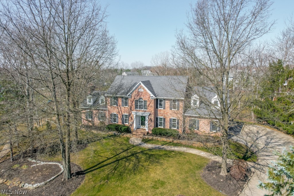 Stately 5 bedroom brick colonial in the desirable Chadds Ford neighborhood! The sprawling floor plan features an impressive foyer situated between the formal living & dining rooms with architectural detail such as wainscoting & wide crown molding that continues through much of the home. A cook's dream kitchen boasts double wall ovens, a gas cooktop & granite counter with bar seating. The casual dining space has transom top French door access to the 4 season sunroom with walls of windows & vaulted ceiling. A floor to ceiling brick fireplace is the focal point in the great room which also has a vaulted ceiling & bow window. An office, laundry room & half bath complete the main level. A winding staircase leads to the 2nd floor where you'll find all 5 bedrooms incl a master suite with walk-in closet & spa like bath with garden tub, step in tiled shower & double vanity! Each secondary bedroom has amazing closet space & access to 2 add'l full baths. The finished lower level adds a wonderful