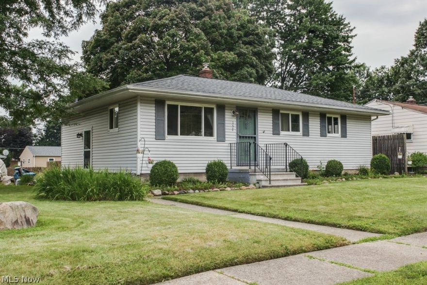 Located in the Bermont Manor neighborhood of Munroe Falls, this 3 bedroom, 2 bath ranch has a huge deck overlooking the nearly quarter-acre backyard. The hardwood floors have been refinished throughout, and are absolutely gorgeous. The basement is partially finished with plenty of space for your game or media room, yet with lots of storage area, and a laundry room attached to another full bathroom. The home is on a corner lot, and would be an excellent home for a new family.
