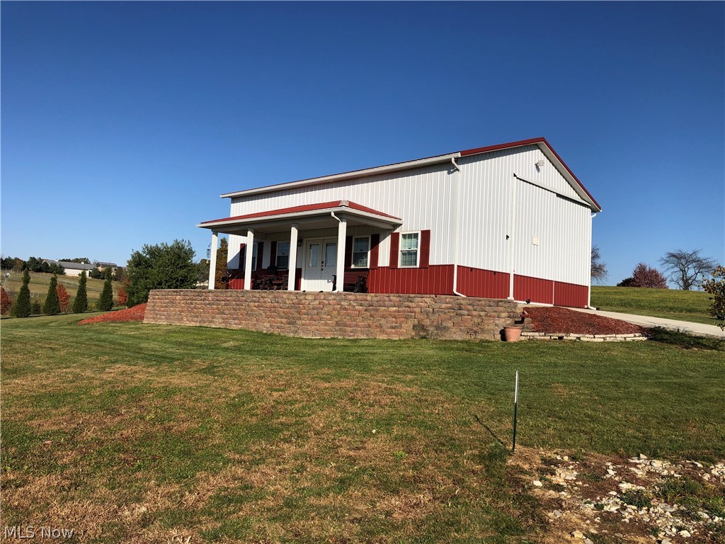 What a great location just outside Sugarcreek on a quiet country road, yet within minutes of town. The Wonderful views of the valley and Great sunsets can make this property appealing for an Air B&B spot or your home. the 1.245 acres has a 32x40 Building that is well insulated, is wired, has a High Efficiency Propane furnace, tall doors for camper access. The building is partially finished inside. Plumbed for a Bath, wired for AC and Dryer. The drive has been installed and a water well drilled. There is a Firepit for you to enjoy the quiet evenings. This could be a BnB with some more finishing touches.