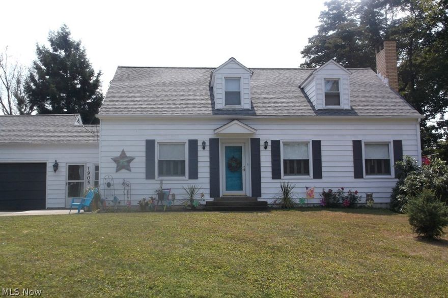 Close to Coshocton Schools with hardwood floors, fireplace, gas heat ,central air , first f.loor master , 2 car garage all on a corner lot with 2 acres .