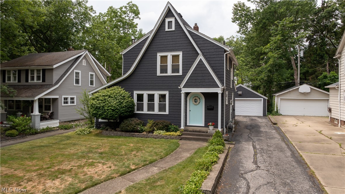 Gorgeous Tudor features so much charm and character – I love the front door! The woodwork and door knobs are so classic. Spacious living room with hardwood floors and fireplace lead you to a screened in porch and formal dining room. The eat in kitchen is spacious offering plenty of cabinet and counter space (all appliances convey) and the back door will lead you to a huge deck! The bedrooms are good size with nice closet space. The full bath is super cute. The basement has been waterproofed by Pioneer Waterproofing. Enjoy your 2 car garage and very large shed for storage! Updates include: roof – 2016 (garage also); AC & electric panel 6 years; windows – 10 years; and home exterior painted – 2021.
"Other" room is the screened in porch.