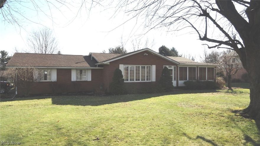 Spacious 3-4 bedroom, 2 bath brick ranch home.  Ceramic tile floors in the kitchen which opens to the dining room.  Enclosed front porch with built in tv.  First floor laundry added into a bedroom closet.  Stackable washer and dryer stay.  Full, walk out basement is finished with a kitchen, family room, bedroom and full bath.  2 car attached garage with openers.  Storage shed.  Utilities for 2016 averaged $45 for gas and $54 for electric for the current owner.  Exclude washer and dryer in the lower level.