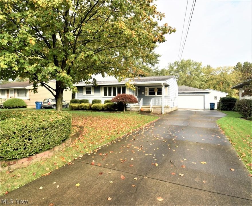 GET READY FOR SOME FOOTBALL!! You can entertain in the semi-finished basement with bar, or on the covered back porch, or in the extra large 2++ heated garage! There is hardwood flooring throughout with a newer eat-in kitchen. Master bedroom is spacious with a newer bath room. Call me for your private tour.