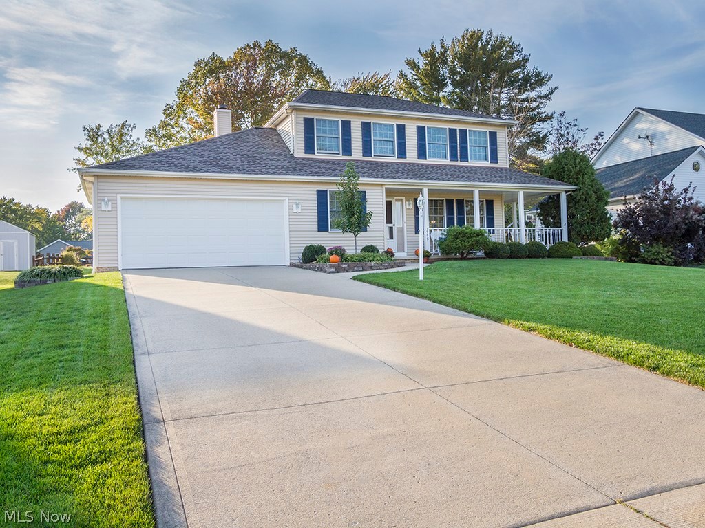 Beautiful and Bright 4BR and 2 Full and 1 Half Bath Colonial, Meticulously updated over the years. Newer Granite Counter Top. Kitchen and Master August 2016. Spacious Living room and Dining Room with chair rail. Beyond the Dining Rm your relaxation room awaits. A fabulous Kitchen open to the Family Room..Leading to a peaceful respite in this open backyard and patio. Upstairs there are 4 large bedrooms and 2 Full Baths (Master Suite and Bath) Outside a charming wrap around porch/patio and yard awaits with lush trees and flower beds. Pride in ownership at its best. This home is flawless and sparkling clean. Orderly and Immaculate!! Fabulous city facilities - Grocery!! All Shopping!!! Rec Center!! Oversized Garage!!
