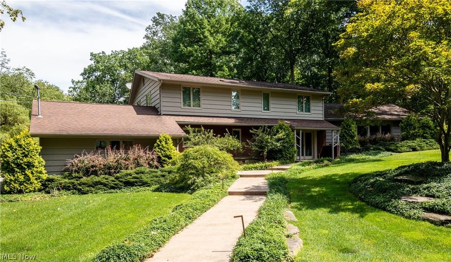 Lovingly maintained by long term Owner, this amazing, 4 bedroom, Multi-Level, is on appx 1.7acres of lush greenery on a prime Pepper Pike Cul de Sac street! Vaulted ceilings in LR and DR with Maple Floors! Vaulted ceilings in Updated Maple kitchen w Granite counters and center island, skylights, updated appliances and a ton of storage!! Sliders lead to expansive deck! Delightful Bkfst area overlooks deck and fabulous pool! Fam. room a few steps down from Kit with Stacked stone, custom Wood Burning Firepl with stone trim and hearth, Blt-ins and bookcases remain! Fam.rm has access to fabulous yard! Totally redone and expanded Master suite, vaulted ceiling, Cherry Flooring, with balcony,walk in closet/dressing room 15x13, and incredible Bathroom, soaking tub and oversized shower, gorgeous tile, could be out of Architectural Digest, very Zen!! Two more bedrms up, each w en-suite baths updated in 2020! Bedrm and bath on 1st (updated 2020) and on lower level also with full bath! LL is finished with rec room, addt living suite, but egress is up the steps to main level. Three plus car garage! Circular Driveway! This home is ideal for entertaining, and conducive to large gatherings as to open flair and setting! Zoned HVAC! (Foyer, one bedroom, full bath, powder room and Family room and garage on entry level, a few steps up are LR/DR/KIT, then upstairs is MBR Suite and two other bedrooms and two baths PLUS master bath). Don't miss this one!