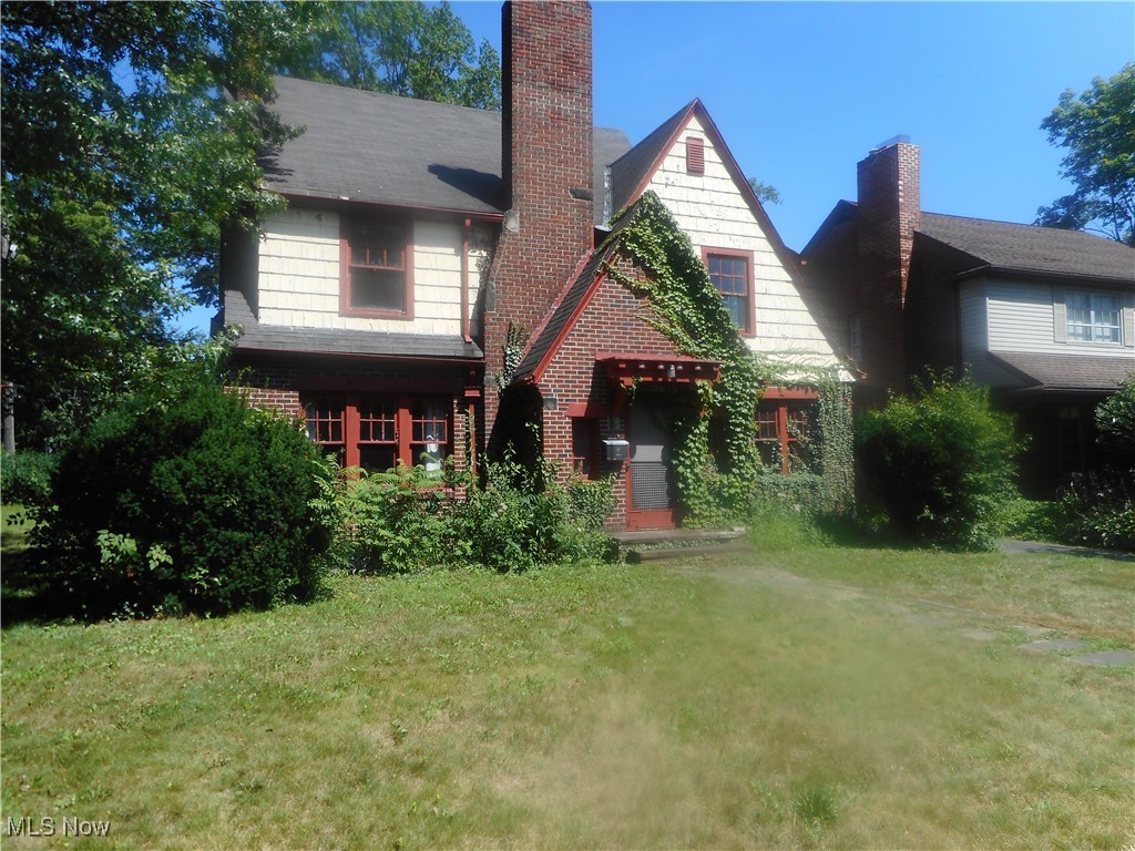 Needs a ton of work and a ton o updating. Buyer to assume city point-of-sale and escrow requirements. Spacious rooms. Hardwood floors, except in kitchen and bathroom. Natural woodwork in main rooms on first floor. Leaded glass corner cabinets and door leading to patio in dining room. Fireplace with marble surround in living room. Leaded glass cabinets and bookshelf in library. Library has french doors leading to living room. Cedar closet on third floor. 3 car detached garage with loft. Spaious lot. Although there is an interior waterproofing system, water seepage was obsered on basement floor.