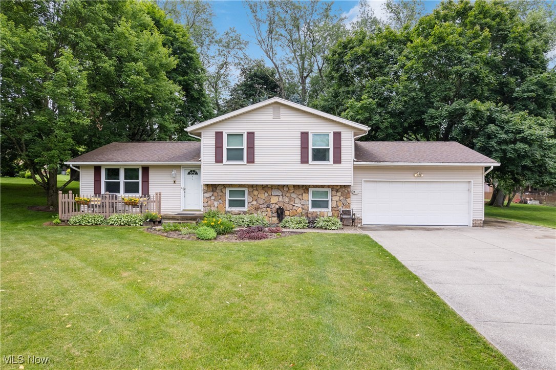 Awesome location for this 3brm 2 full bath home located in the top rated Lake Local School District. Located on a cul de sac in the Hidden Knolls Allotment and just a short walk to Uniontown community park, ball fields, and play ground. As soon as you pull in you will notice the extra wide concrete driveway with parking pad to the right for extra cars, trailers, or camper. Huge back yard is amazing with above ground pool, 2 sheds and a large brick patio with built in fire pit. Very private for an allotment with lots of space. First floor features a large 19x12 eat-in kitchen with island and all the kitchen appliances (Fridge new in 2023). Off the kitchen is an addition that was completed in 2008 with a slightly vaulted ceiling, fireplace and slider leading to the back composite deck new in 2022. Upstairs offers 3 bedrooms and new bathroom in 2022. Lower level has another living area with built in desk/storage area, full bath new in 2020 and laundry room with washer/dryer included. Also in the lower level is a 20x12 storage area off the laundry room. Other updates include roof 2020, A/C 2016 and windows in 2000. This one has so much to offer at this price and will make a great house to call HOME!