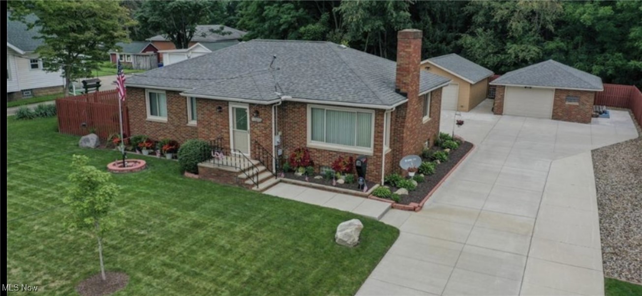 Excited to present this three-bedroom, two full bath brick Ranch in the beautiful city of Kent! The first floor gives way to a kitchen, dining room, living room with fireplace, full bath, & three 1st floor bedrooms! The large 1,052 sq ft basement is finished with high ceilings and plenty of light, has a full additional kitchen, full bath, laundry room, and plenty of storage. Fantastic home to entertain! The rear of the property has (2) two car garages, an enclosed patio, a BBQ area, and a fenced-in backyard. This is truly a unique property that seems to have it all! Please read the Home Improvements & Updates supplement; too many to list here. Book your showing today!