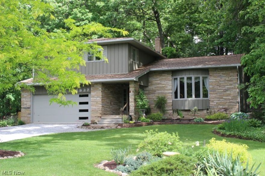 Absolutely beautiful soft contemporary w/4 bedrooms, 2.5 baths & approx 2206SF* Volume ceilings, crown molding w/cornice, extra wide base board, track lighting, brush nickel fixtures, skylights, 6 panel doors & oversized Pella windows overlooking park like setting*Foyer entry w/ceramic flr & newer door w/side lights & beveled glass *Vaulted living rm w/large bay window*Formal dining* Eat in vaulted kitchen w/double skylight, island, detailed crown molding & view of patio/garden* Family rm w/WB stone FRPL w/insert, ceramic floor, track lighting & oversized patio door to private partially covered deck*Spacious 1st flr laundry w/full wall of cupboards & ceramic flr*Updated 1/2 bath w/ceramic flr* Master w/walk in & updated master bath w/oversized tile & glass shower, double vanity, cork flooring* 3 add'l generous size bdrms,updated guest bath & laundry chute* Covered slate front porch*2 tier deck w/serpentine decorative wall*Very private setting on cul de sac approx .6 acres* Updated 200a