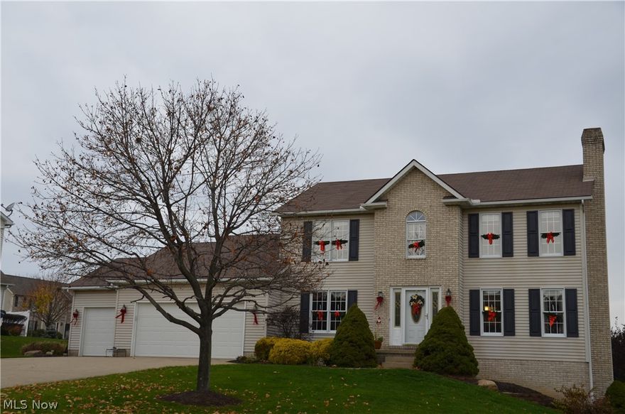 New Carpet throughout house, Newer granite, sink faucet, dishwasher, lighting in kitchen and bathrooms, New air conditioner in 2015, washer/dryer is newer, walkout basement with deck. Additional storage in basement with . 3 car garage 5 Bedrooms with den.