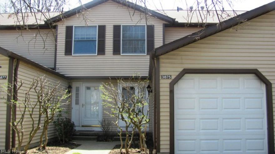 Updated open & neutral 2 bedroom, 2.1 bath home with rear private fenced patio. Home features tiled kitchen with tile backsplash, 4 person breakfast bar, new gas stove, refrigerator and DW all overlooking berber FR complete w/decorative WB fireplace/mantle and slider to back yard. 1st floor includes tiled 1/2 bath with wainscoting, chair rail, pedestal sink. Tiled foyer. Upstairs has 2 very large bedrooms with equally impressive closet space. Full tiled bath with pedestal sink on second floor. Finished berber carpeted lower level family room w/wainscoted bath, chair rail. Ideal separate space for entertaining, office, arts & crafts. Updated: Furnace, C/A, HWT, garage door. All appliances stay including Newer washer and dryer and new stove, kitchen stools, LR drapes, upstairs bedroom blinds may stay. White trim, thick baseboards, silver light fixtures/hardware throughout. Great location for all amenities.