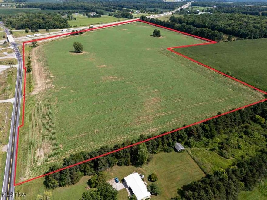 Exceptional Investment Opportunity! NO ZONING.  Discover the potential of this 62.7 acre property featuring 53.+/- acres of tillable farmland. Perfectly positioned at the corner of a state route and the I-71 interchange. This property offers unmatched visibility and accessibility, making it a rare find for investors, developers or agricultural use.   Frontage on I-71 and St. Rt. 539.  Approximately 9 acres are located in the I-71 right of way. Buyer should do their own due diligence into local and county zonings.  Tenant has crop rights for
this year.