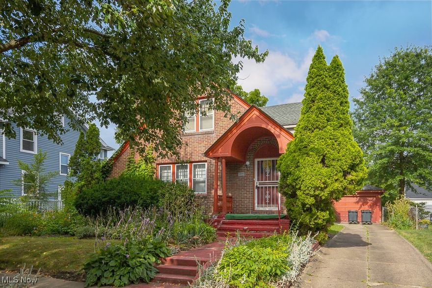 Brick Cape Cod available in West Akron! This property has two ample sized bedrooms on the first floorin addition to an extremely spacious second level suite (that can be used as a master bedroom), one full bath a a one car detached garage. The beautiful wood work throughout this property definitely adds to this home's character, not to mention the beautiful hardwood floors beneath the carpeting! The basement waterlines, electrical panel and central air were all replaced in 2023; hot-water heater replaced in 2020. This is an estate, please contact a real estate professional to schedule your private showing today!