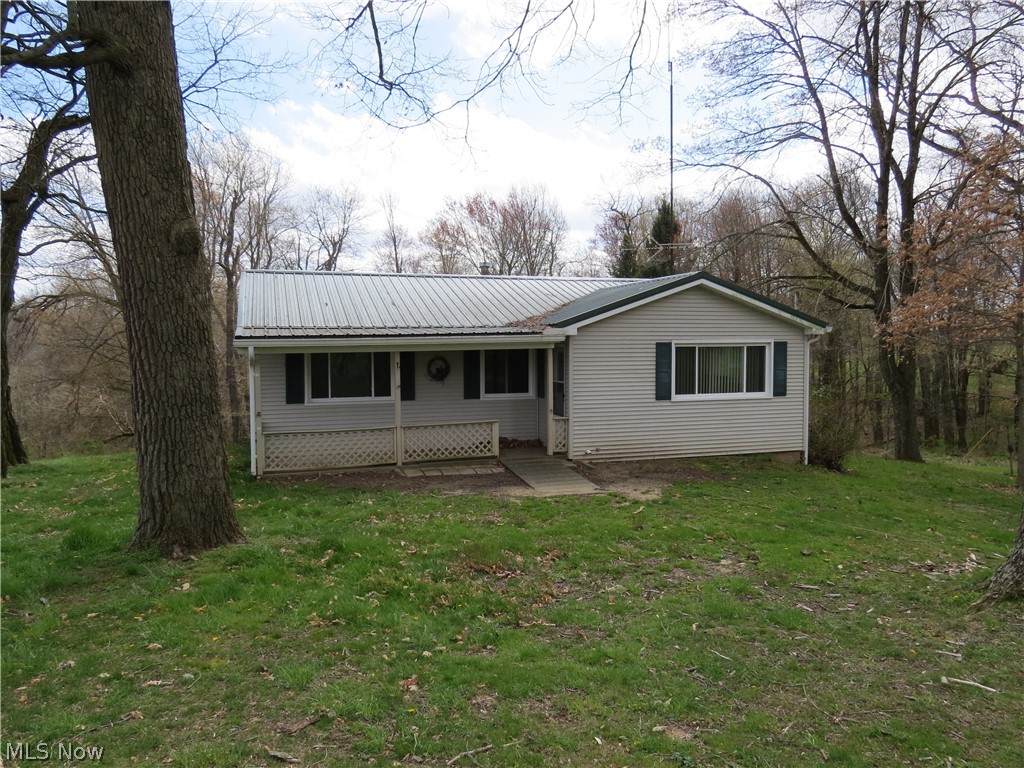 Private 2.3 acres with Ranch Home in the Country! You'll want to see this wonderful updated 3 bedroom 1 story with a full walk-out basement that is situated at the end of a township maintained road. Property is mainly wooded with lots of big trees and abundant wildlife. There's room for a garden and you'll enjoy the views and privacy of sitting on the rear deck. There is a 1 car drive-under garage and updates include windows, furnace and AC, vinyl siding, metal roof, UV light water treatment system, birch flooring, remodeled bath, etc. A unique feature is a former one room school house on the property that is used for storage, and there's a chicken house also. These are new property parcels so the annual taxes are yet to be determined, but the former tax bill was a little over $1000 annually. Minerals do not transfer with property. Call to view this wonderful property!