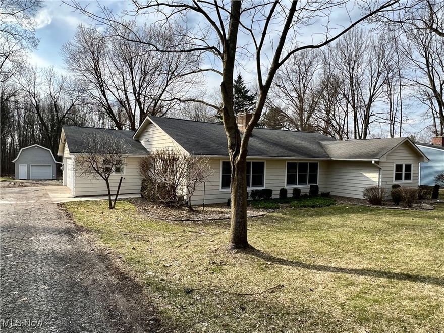 Enjoy One Floor living in this desirable Ranch in the heart of Burton Village! This wonderful home offers approx 1700 sqft of living space with 3 bedrooms, 2 full baths, great open floor plan & neutral decor throughout! Living Room/Home Office with large picture window. Family Room with brick fireplace & wood burning stove opens to Large Eat-in Kitchen with center island breakfast bar, pantry & ceramic floors. Dining area with sliders to expansive deck overlooking deep backyard. All 3 bedrooms have hardwood floors. Master Bedroom with remodeled Master Bath includes ceramic shower & granite vanity. Generous closet space throughout. Central air. New Anderson windows installed in 2023. Exterior cedar siding painted in 2023. Attached 2+car garage plus 16x20 Outbuilding with covered overhang with electric & 2nd floor storage. Just steps away from Burton Square, restaurants, shopping, library, and close to newly-built Berkshire School Campus!