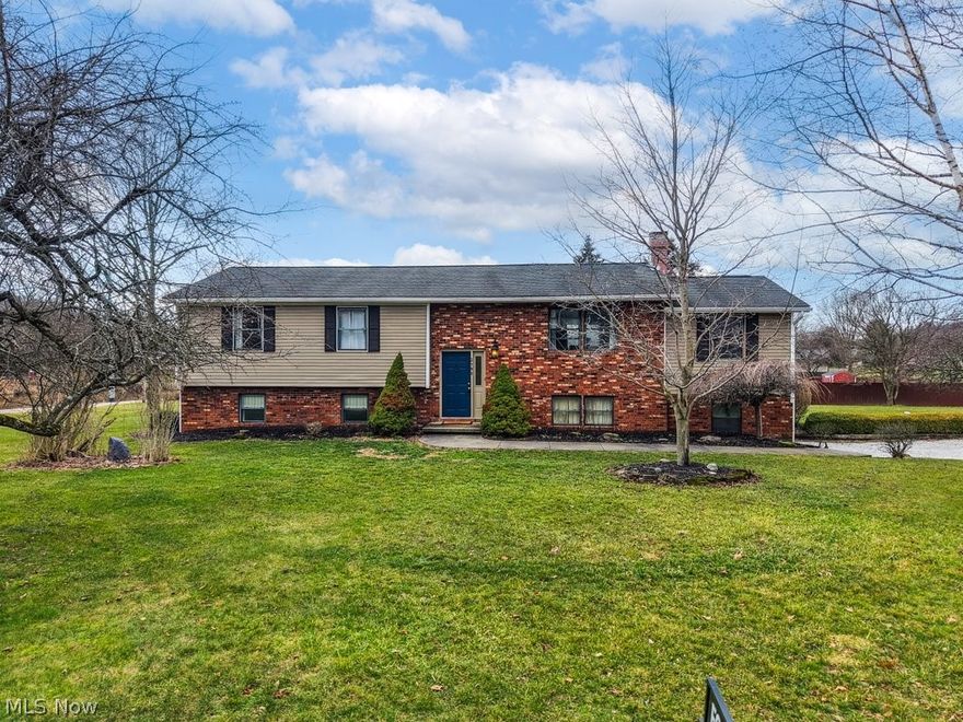 Welcome to 2190 Waterbury Drive! Thoughtful updates, space to breathe, freedom, and modern comfort come together on a beautiful ACRE corner lot in Uniontown. No HOA restrictions, updated interior, and a huge and usable yard from the walk-out lower level. Get turnkey living without compromise. The main level features family room/den with a fireplace, living room, dining and kitchen, full bath and three bedrooms - attached to the deck overlooking the yard. The kitchen has been stylishly refreshed, featuring updated cabinetry, new appliances, modern hardware, new sink and faucet, LVP flooring, and a contemporary back splash that brings the space to life. Both functional and attractive—ready for everyday living and effortless entertaining. The lower level has a large rec room with new gas wall heater, laundry, garage access, bonus room, full bathroom. Each full bathroom has been tastefully improved. New carpet ('23) adds warmth and comfort throughout much of the home. Full interior paint update and modern light fixtures in '23 create a clean, cohesive feel. Step outside to the expansive one-acre property, complete with a large deck featuring brand new sliding doors and gazebo (stays with home). The space is perfect for relaxing evenings or hosting guests. Country feel without being far away from modern amenities. The yard also offers a dedicated fully fenced section, ideal for pets, play, or gardening. There is a fire pit area ready for gatherings year-round. Enjoy a two-car attached garage and large shed (15'W x 18'L x 16'H) for additional storage. Situated on a sizable yard off Killian and Waterbury, this bi-level offers both freedom and flexibility in a peaceful setting while remaining conveniently located near everyday amenities. Move-in ready, beautifully updated, and offering space inside and out—this is the one you’ve been waiting for. Sellers are offering a home warranty at closing for buyer peace of mind.