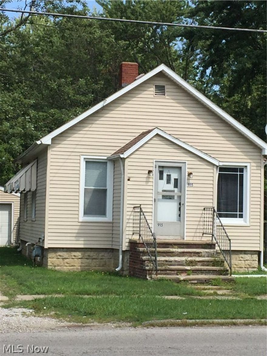 Great location. Partially fenced back yard, 1 1/2 car detached garage.  1-2 bedroom, full basement with Wave System in 2013.  Gas heat (furnace is 6 yrs old), 2 yr old hot water tank.  Being "SOLD AS IS".    5 lots in total for 0.44 acres.  Large trees for shade.