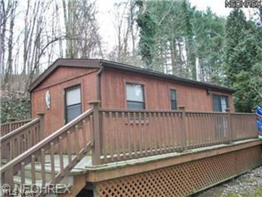 Cedar sided 1997 Forrester mobile home on private ground at Atwood Lake in the Sunset Valley area. Very nice get-a-way. Close to the lake. All furnishings stay. 1 Bedroom, 1 Bath. Maybe possible to get a dock on the lake. Patio furniture and gas grill stay. Immediate possession. Home not taxed as taxed estate.