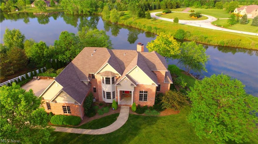 DREAMING OF A WATERFRONT HOME? Don't miss out on this unique & gorgeous lakefront oasis to enjoy all summer, it will check off all your needs & wants! This immaculate updated home on 3.5 pristine acres is move in ready & in Highland School district! As you walk through the front door & experience the phenomenal views you will never want to leave! The first floor is open concept, so it's perfect for entertaining guests or family gatherings, and features a 1st floor master suite, master bathroom w/soaking tub, separate shower, his & her sinks, walk in closet, & water closet. Natural light fills the great room & sun room which are ideal for relaxing and savoring the lake views. The Sun room leads to upper patio to dine al fresco, enjoying the summer breeze. The updated kitchen delights w/hickory cabinets, quartz countertops, breakfast bar seating, morning room, & large laundry room. Upstairs are 3 spacious bedrooms w/ample closet space, 2 full bathrooms, one a Jack & Jill. The lower level