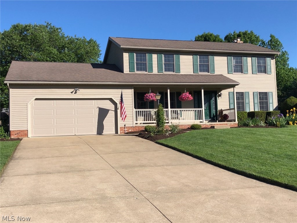 Pride of ownership shows in this beautifully maintained 4 bedroom home in Jackson Township. You'll feel right at home the moment you step onto the inviting front porch that leads you into the open foyer with an office space and formal dining room on either side. The showstopping kitchen is the perfect place to prepare your favorite meals with gorgeous granite counters, custom soft-close oak cabinets, an under-mount sink, stainless steel appliances, and great views of the backyard. Just off of the kitchen, there is a first-floor laundry room and half bath. The dinette features sliding glass doors that take you out to the deck where you can relax or host outdoor gatherings. The cozy family room offers a floor to ceiling brick fireplace with a wood mantle and built-in shelving. Make your way to the 2nd-floor master bedroom with an incredible full private bathroom with a dual vanity, custom cabinets, and a tub/shower and not to mention the large walk-in closet. Each additional bedroom and