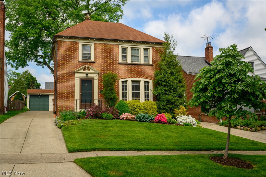 Beautiful, extremely well maintained brick colonial in highly sought after SOUTH HILLS! This 2 bedroom, 1.5 bath brick home has been impeccably maintained inside and out. Gorgeous hardwood floors throughout the home. The main floor features a cute kitchen w/high-end cabinets, pantry, 1/2 bath, dining room w/ built in china cabinets, access to patio and beautiful large light filled living room! Second floor holds both bedrooms, the extra large owners suite is bright and airy with double closets and second bedroom is very roomy as well. Tiled full bath and and big linen cabinet. The basement is partially finished with a wood burning fireplace, and cocktail bar! The utility room has new flooring and paint, laundry area and lots of shelving. Updates include, updated electric box 2022, newer HW tank, new basement flooring and paint. The backyard is stunning w/ flower gardens, a back patio w/ full awning. Walk behind the garage to the breathtaking deck area (trex decking) w/ more flower gard