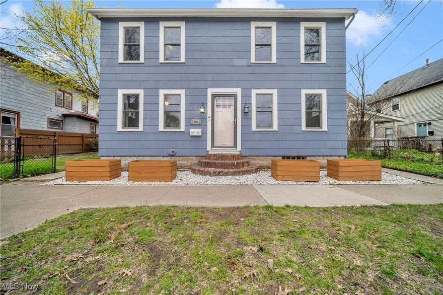 Welcome to 3902 Woodbine Ave, a stunningly remodeled home in the heart of Ohio City! Thoughtfully redesigned in 2022 with high-end designer finishes and engineered hardwood floors throughout, this home offers the perfect blend of modern luxury and effortless comfort. The open-concept eat-in kitchen is a chef's dream, boasting a large island, state-of-the-art appliances, and ample storage. A generous dining room is flanked by two inviting living spaces, plus an additional flex room ideal for a playroom or home office.  

Ideal for single-floor living, the first-floor primary suite features a spacious bedroom, a versatile flex space perfect for a walk-in closet or office, and a full bath. The convenience continues with first-floor laundry in the mudroom and a stylish powder room for guests.  Upstairs, three well-sized bedrooms share a luxurious bathroom with a soaking tub and a walk-in shower.

A rare find in this neighborhood, the home also offers a full basement with high ceilings perfect for storage, a home gym, or a workshop. Outside, enjoy the oversized fenced-in lot with a pergola-covered patio, creating a private outdoor oasis. The two-car garage is accessed from a rear alley to your own driveway which provides extra off street parking.

Just a short 10-minute walk to the vibrant scenes of West 25th and Hingetown, you'll find some of Cleveland's best restaurants, cafes, and shops.  Don't miss this incredible opportunity to own a beautifully renovated home in one of Cleveland's most sought-after neighborhoods!