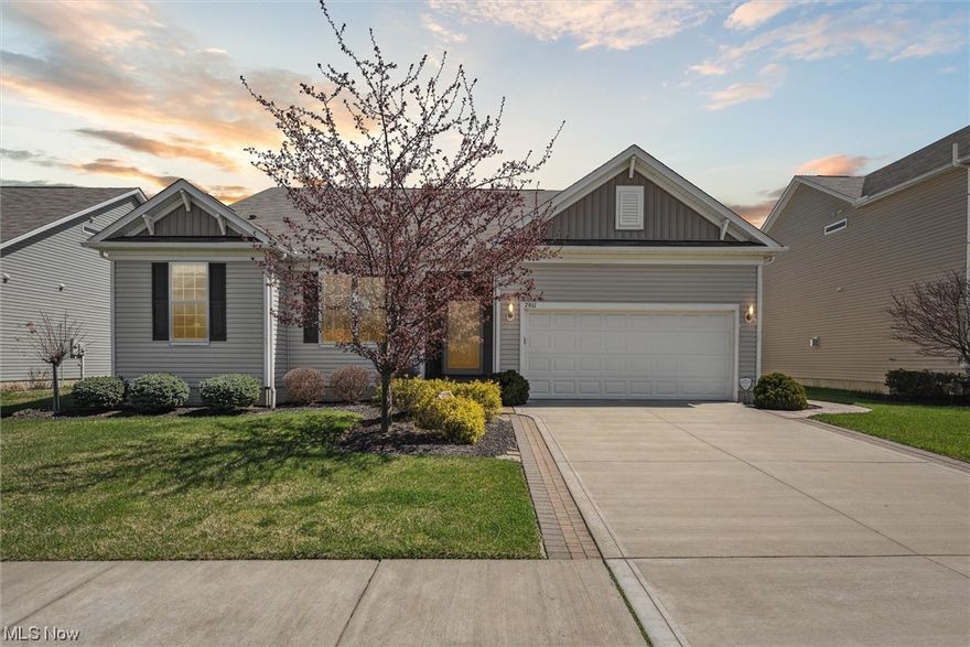 This 2400+ sf RANCH home in a lovely location is a rare find. It is 1 mile from I-90 for very easy access to downtown Cleveland, shopping and is very near the new Cleveland Clinic. There are 3 spaces for cars in the garage but one is tandem ( Only 2 car door) and is being used for storage. The neighborhood amenities include sidewalks, a Pool, nature trail and play ground. As you walk into the lovely foyer with crown molding and wainscotting you'll love the open floor plan.  The kitchen has upgraded stainless steel appliances including a Double wall oven and newer refrigerator, gas stove, granite countertops, a tile backsplash and an island with breakfast bar. A great room has a lovely stone fireplace and custom blinds. There is a sunroom (also has custom blinds) that looks out at the spacious maintenance free deck and backyard filled with Evergreens. A nice sized main bedroom with ensuite and walk in closet makes a wonderful sanctuary for owners. Two other bedrooms a very large office,