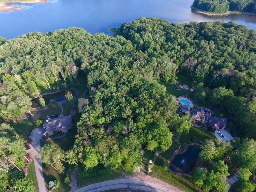 Build your dream home on this wooded, 3-acre lot that backs up to property surrounding beautiful LaDue Reservoir (reservoir owned by the City of Akron). Kenston School District, Underground utilities, Backs up to City of Akron property surrounding LaDue Reservoir, Mature hardwoods, Cul-de-sac.