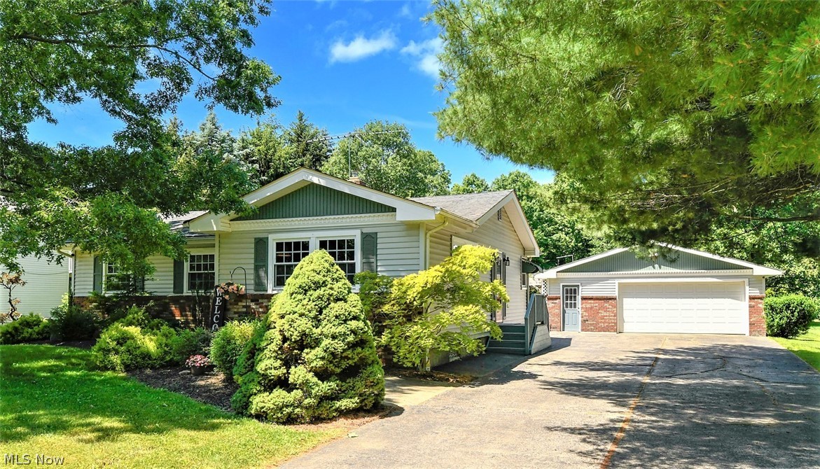 **Beautiful Copley Twp Ranch W/1700 Sq. Ft, 3-4 Bedrms, Finished Basement, 1.5 Bathrms & 2.5 Car Garage On .62 ACRES!! *Long Paved Driveway, Oversized Garage W/Extra Space For Riding Lawnmowers & Atv's *Relax & Unwind On A Peaceful Serene Back Patio W/Pergola & Wisteria Listening To The Sound Of A Waterfall In The Heated Koi Pond! *Tree Lined Back Yard W/No Immediate Neighbor View Behind *Living Rm Showcasing Newer Carpet, Gridded Windows & Wood Accent Wall! *UPDATED Kitchen W/Fresh White Cabinets & Nickel Hardware, GRANITE Beveled Countertops, Diamond Inlay TILE Backsplash, FARMHOUSE Style 4 Light Studded Wood Caged Rustic Chandelier & CUSTOM WOOD PALLET Feature Wall! Under Cabinet Lighting, BRAND NEW Refrigerator, Wall Oven & Stovetop!! Sliders To The Back Yard *Three 1st Floor Bdrms Include Wood Slider Closet Doors, Upgraded Blinds & Master W/Ceiling Fan + ENSUITE Master Bathroom! *Master Has Access To It's Own Half Bath W/Pocket Door Enclosure To Another FULL Bathroom W/2nd Toilet