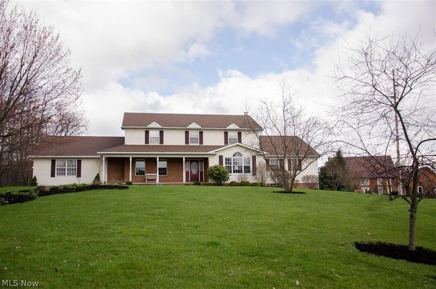 Need a first floor master or in-law suite with separate entrance than this spectacular two story home is for you!  This impeccably maintained home has 5 BR/3.5 BA & 6 car gar. With over 4,000 sq ft, an extensive list of updates & an expansive 3.96 acre lot, this is a rare find in the Green LSD. This home features a 3 car heated attached garage with stairs to the basement, plus a detached 3 car heated garage. The warmth & extraordinary quality of this home is immediately evident from the 6 panel oak doors & crown molding, to the newer porcelain tile in the kitchen, sun room & laundry room. The 1st floor master suite is currently used as an amazing in-law suite. The large, open kitchen has an island and incredible cabinet space, plus a full compliment of appliances. The spacious 2nd floor master suite is truly an oasis for the home owner, with a walk in closet, loads of room to roam and relax, plus an updated master bath. To accommodate the 4000 square feet and additional living quarters