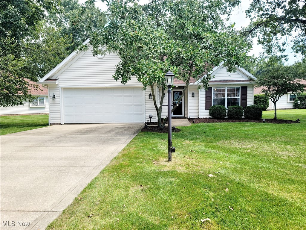 Live like you're on vacation in the private lake community of Aurora Shores. This freestanding condo feels like a single family home with a full size driveway, full size front yard, full size backyard, & plenty of space in between units. Great room has vaulted ceilings & is open to the formal dining room with tray ceiling. Vaulted primary bedroom has newly updated private bath (2023) with new faucets/fixtures/hardware, flooring, updated vanity, & quartz counters 2023. Newly updated guest bath (2023) has updated vanity, new faucets/fixtures/hardware, & flooring. Newly remodeled kitchen has granite counters, new hardware, new flooring & new appliances 2016-2018. New stove 2024. New fridge 2025. New faucet 2023. Entire interior painted 2023. New hardwood & ceramic flooring 2016-2018. New lighting fixtures throughout. New Speed Queen washer/dryer 2024. New Roof 2016. New gutters 2016. New tankless hot water tank 2023. New furnace 2025. New A/C 2025. Upstairs loft area has 3 huge closets & a walk in attic space. Relax on the expanded patio with new privacy fencing, freshly planted trees, & landscaping. 305 acre lake for swimming, boating, fishing, tubing, water skiing, kayaking, & paddling. 2 soft sand beaches, 2 heated inground pools. 4 Tennis/pickleball courts, basketball courts, volleyball court, baseball diamond, game room, 2 playgrounds, marina, party room, & more! Private dock space available for $250 per season! This one won't disappoint!