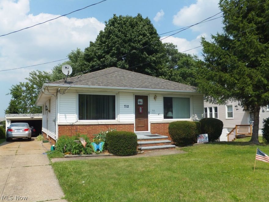 Aluminum sided ranch,dining room,rec room,updated 100amp electric box,glass block windows,newer furnace and central air,deck,2 car garage w/opener