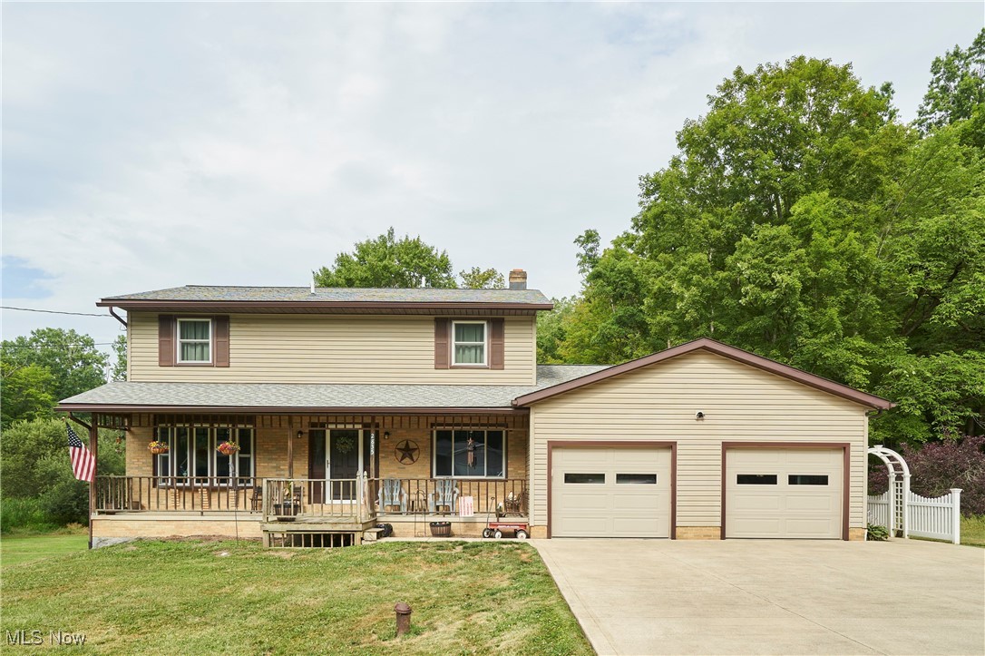 Welcome to 2835 Sunnybrook Rd in Mogadore! This spacious 4-bedroom, 2.5-bath colonial is conveniently located and sits on nearly 4.5 acres—offering a perfect blend of comfort and privacy. The first floor features generous living spaces, including an open kitchen with plenty of cabinet and counter space, brand-new appliances, and great flow for everyday living or entertaining. Upstairs, you'll find large bedrooms with ample closet space. Enjoy peaceful views out back with a quiet setting, complete with a patio and deck area—ideal for relaxing or hosting. Additional highlights include free gas, a 2-car attached garage, and brand-new windows and two new sliding doors installed in 2025. This is a rare opportunity for space, efficiency, and serenity—schedule your showing today!