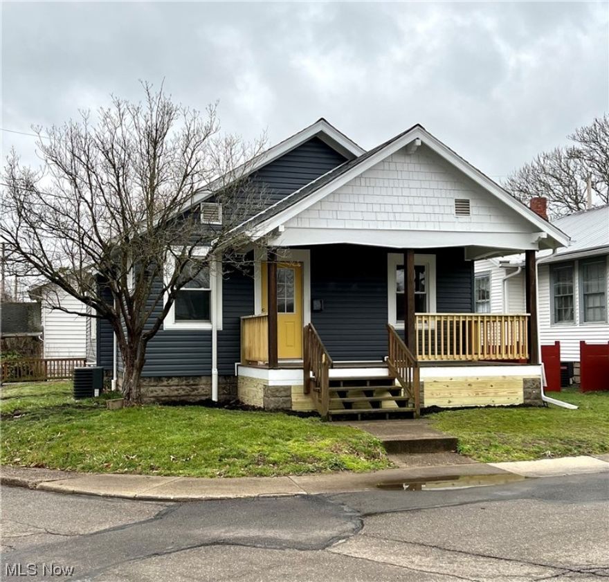 This renovated 3 bedroom, 1 bathroom house is now available for new owners! The list of " brand new" items in this house is LONG and includes furnace, central air unit, roof, siding, paint, flooring, lighting, kitchen cabinets and countertops, bathroom, new stainless appliances and more! Small but mighty, this home packs alot of punch for the money.  Also featured are a nice front porch with new railings, finished attic for the 3rd bedroom, and the washer/dryer are even included.  If that doesn't give you enough peace of mind, the seller will provide a free 1 year home warranty! Call your agent today for a private showing! Agent owned