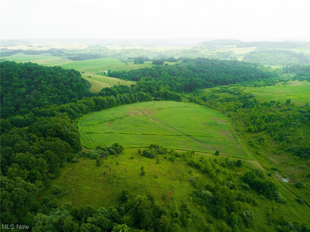 ONSITE AUCTION Tuesday, September 12th at 6:00 PM. This deer hunters delight has a lot to offer including food plots, open fields, brushy draws, several stand sites and of course the most important thing of all, Location!! Just minutes southeast of West Lafayette this 118 acres sprawls across several valleys and would make a quality investment complete with mineral rights just in time to enjoy the fall hunting season. Parcel 1: 21.55 Acres with 902’ of road frontage. A lot of the groundwork has been laid with a nice driveway put in and cleanup done around an older home that could have potential with a remodel. Approximately 14.5 acres of open field that has been planted as a food plot and offers abundant potential for some field edge hunting. Parcel 2: 96.63 Acres with 329’ of road frontage. Approximately 8 Acres of wooded ground with the remainder being open ground with several large established food plots. Several hunting blind are included on this parcel with lots of potential exist