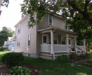 Great side by side duplex, both rented for $550.00. Each side has 2 bedrooms, a dining room, and a living room. Each side also has a basement. There is a 2 car garage with separate office or work shop. Garage has newer roof, vinyl siding, gutters, and gravel driveway. Very nicely kept. Both sides have 1 yr lease agreements and deposits. Each side does have parking, covered front porch, plus side porches, vinyl siding. This property has 2 lots, a very nice yard. Corner Lot. Many updates.