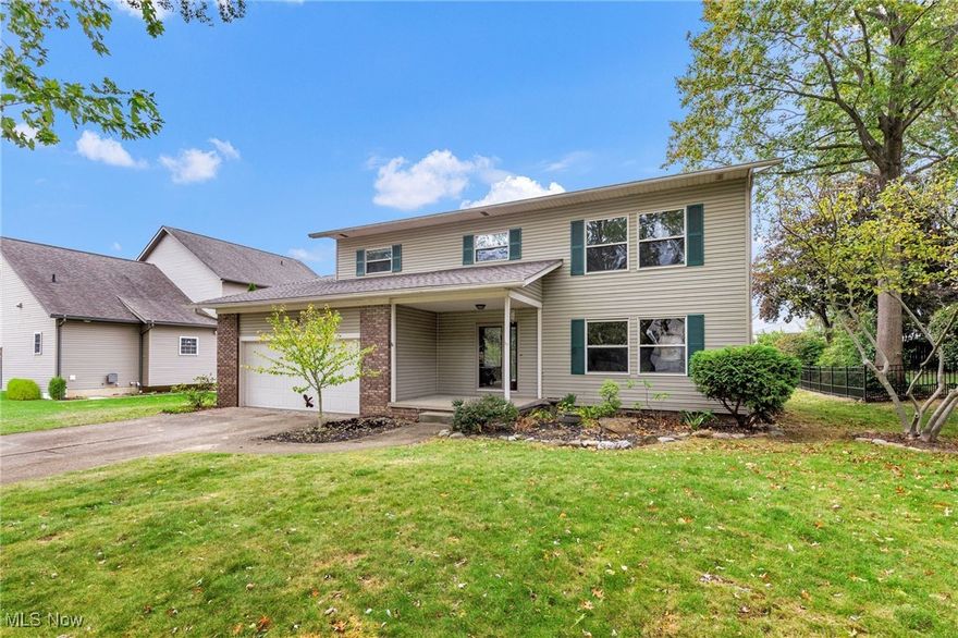 Step into this warm and inviting four-bedroom colonial! The entryway features maple hardwood floors that continue into the kitchen and dining room, creating a seamless flow throughout the main level. The kitchen, remodeled in 2018, boasts custom maple cabinetry, granite countertops, a center island, a wall of additional storage, and stainless steel appliances (2020). The step-down family room offers the perfect gathering space, complete with an eating bar, a newly refurbished wood-burning brick fireplace, built-in shelving, and a custom wood-paneled accent wall — ideal for cozy evenings at home.
Upstairs, you’ll find four generously sized bedrooms, three of which feature hardwood floors, including the connecting hallway. The primary suite showcases a vaulted ceiling and a remodeled bath with double sinks and a separate commode room with a walk-in ceramic tile shower. The main bath also includes double sinks with a solid-surface countertop.
Enjoy extra storage in the crawl space below the family room and the peaceful surroundings of a neighborhood filled with well-kept homes and mature trees. The spacious backyard is perfect for gardening or outdoor relaxation, featuring a tranquil Koi pond, established grapevines, and blackberry bushes.  Call for your private showing today!